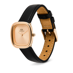 Daniel Wellington Margot women's watch with a rose gold rounded square case, matching sunray dial, and a black Sheffield leather strap.